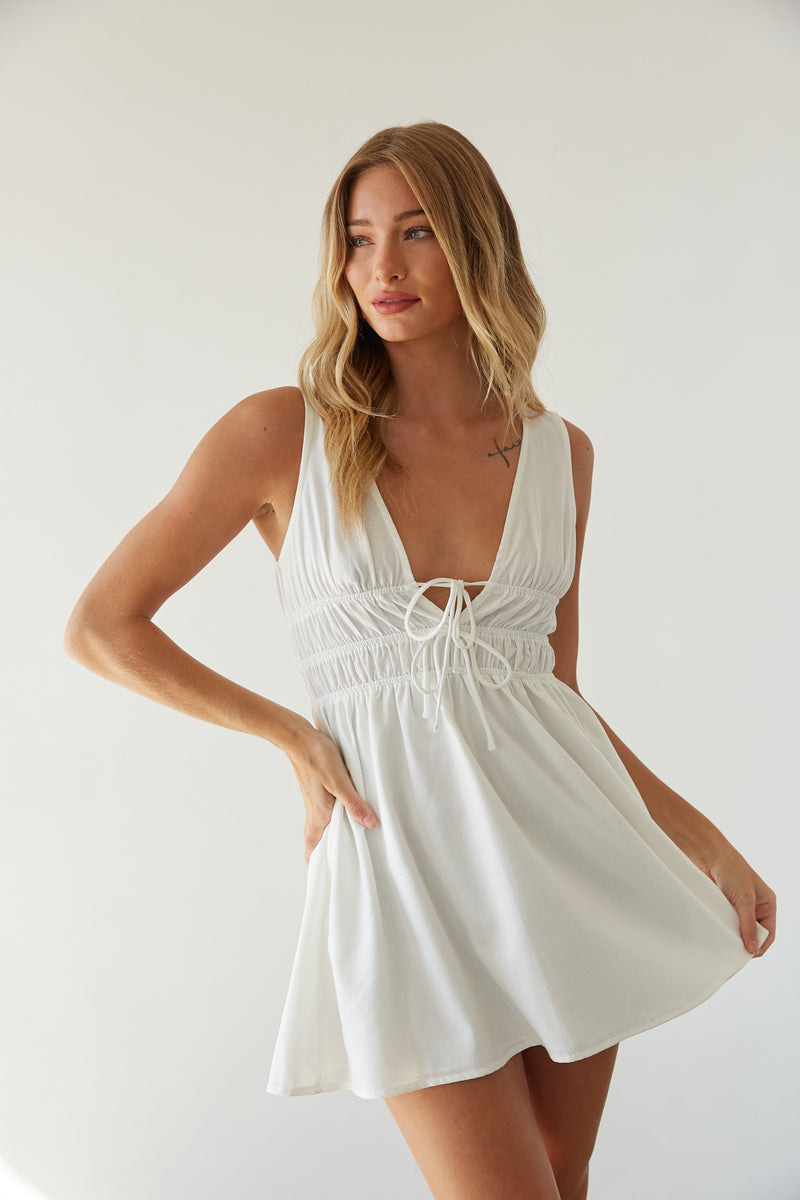 white strapless twist front satin mini dress