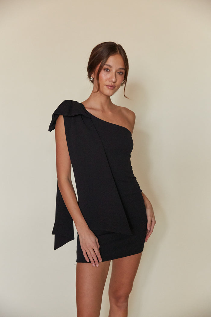 black bow shoulder bodycon mini dress | unique asymmetrical mini dress | black-image