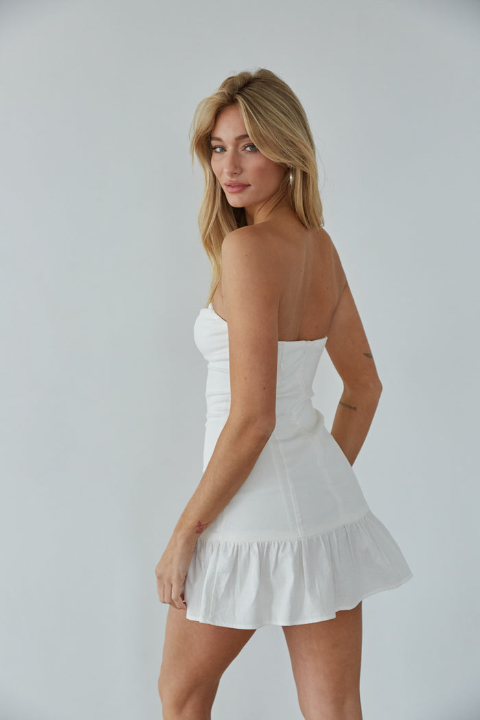 white strapless mini dress - ruffle hem mini dress - graduation dress inspo