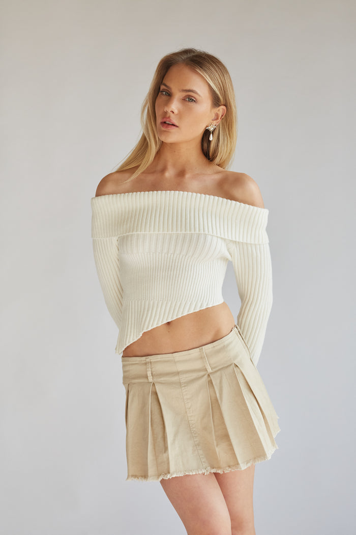 cream ribbed knit fold over off the shoulder asymmetrical hem sweater top | spring sweater must haves 2024