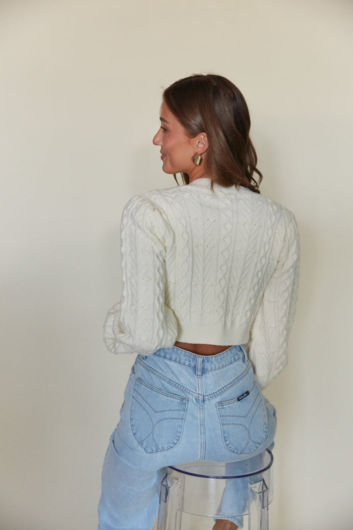 back view cropped cable knit cardigan with bow closure 