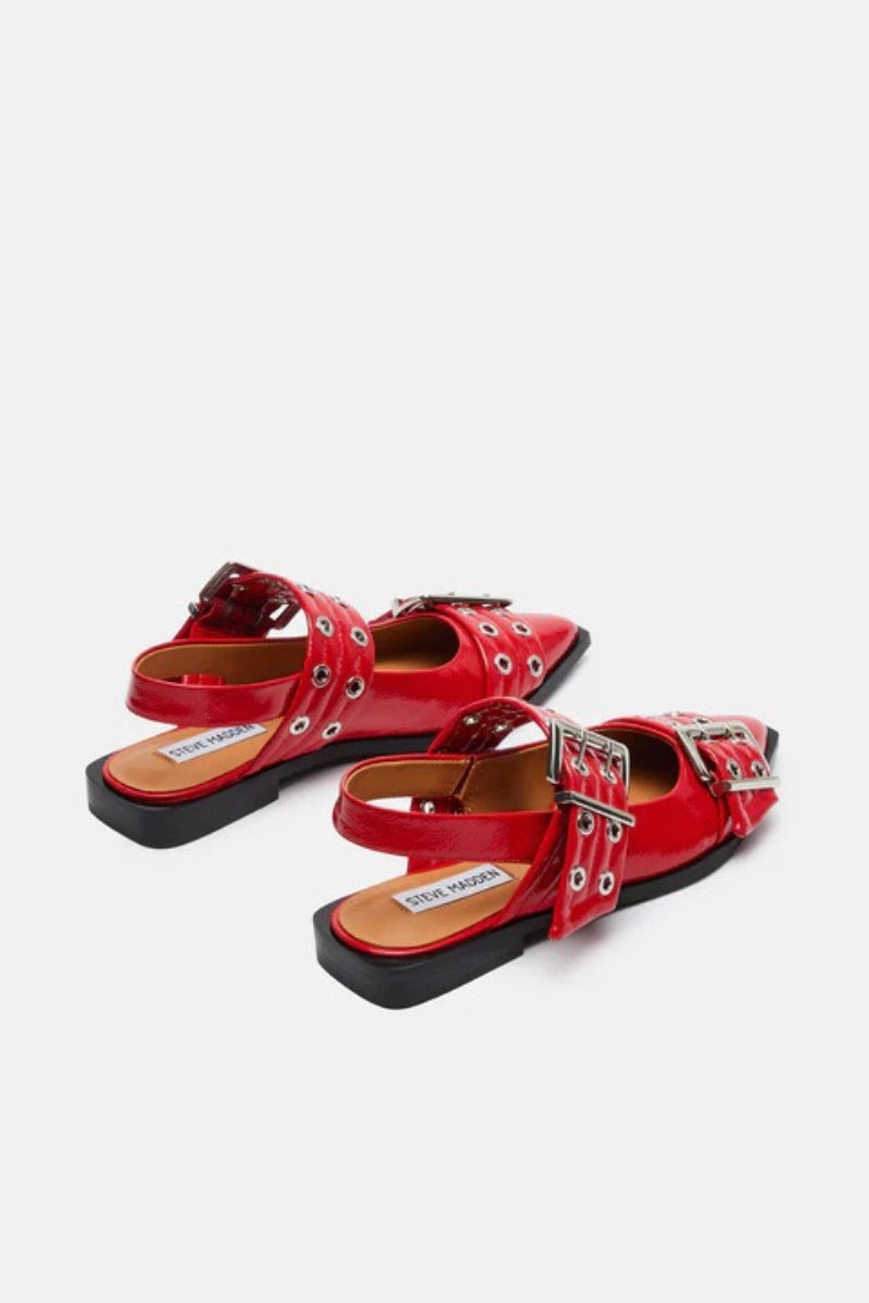 bright red faux leather pointed toe flats with silver buckles | red steve madden shoes for spring