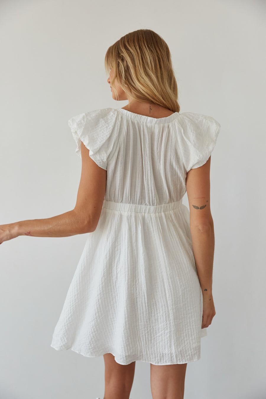back view | white v neck bubble sleev babydoll mini dress | rush mini dress 2026