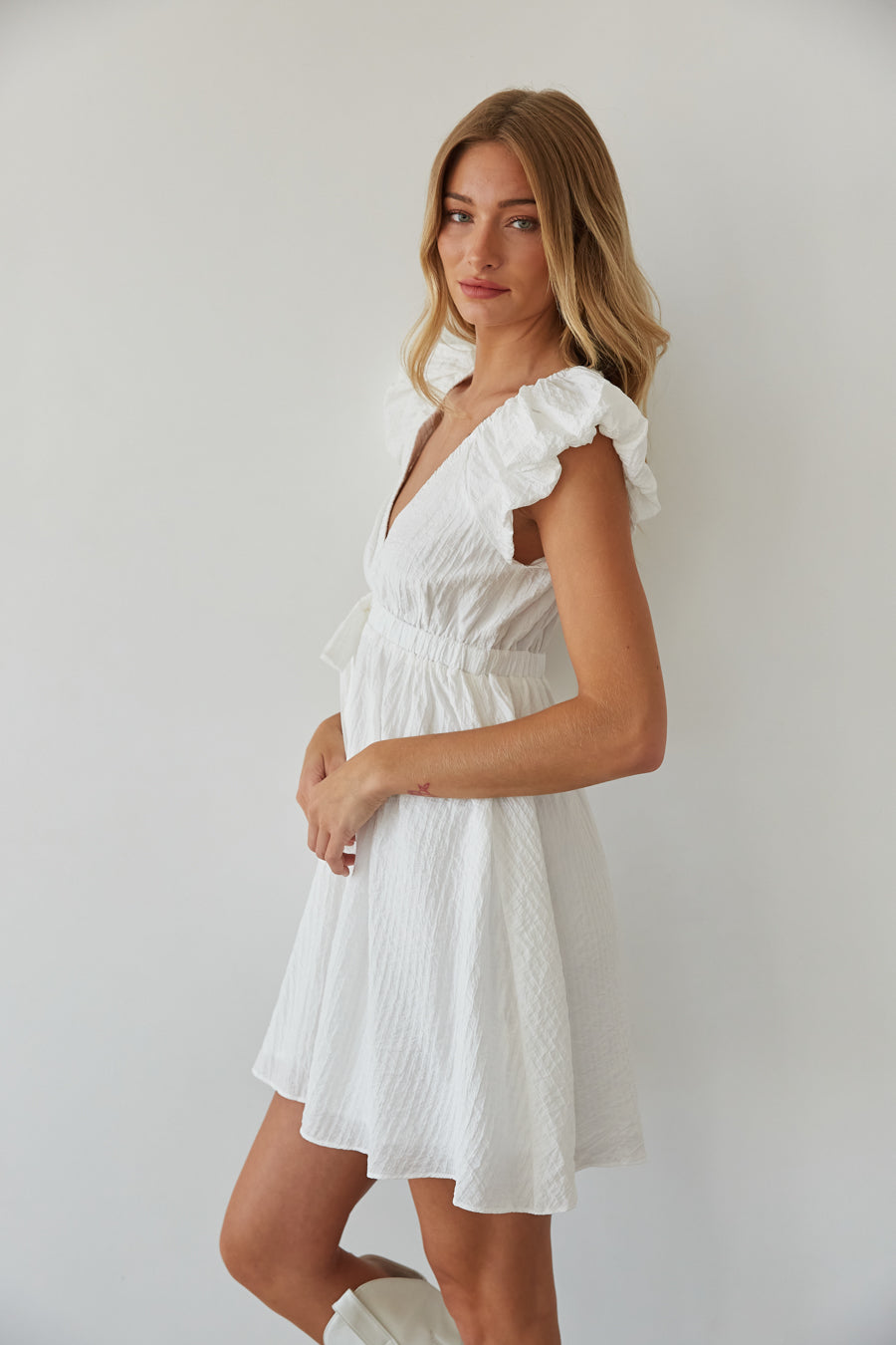 side view | white v neck bubble sleev babydoll mini dress | rush mini dress 2027