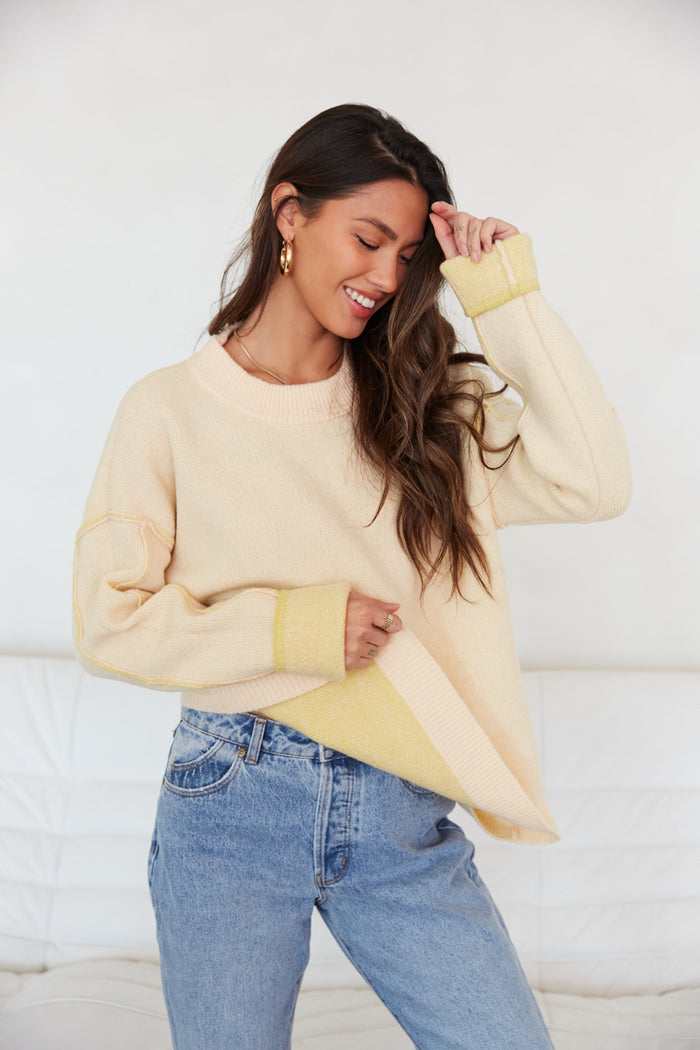 trendy sweaters for winter - peach oversized color block sweater - yellow and pink reversible sweater