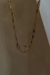 dainty layered gold-toned necklaces
