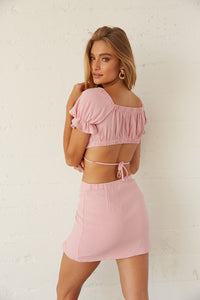 Back view of pink linen mini skirt