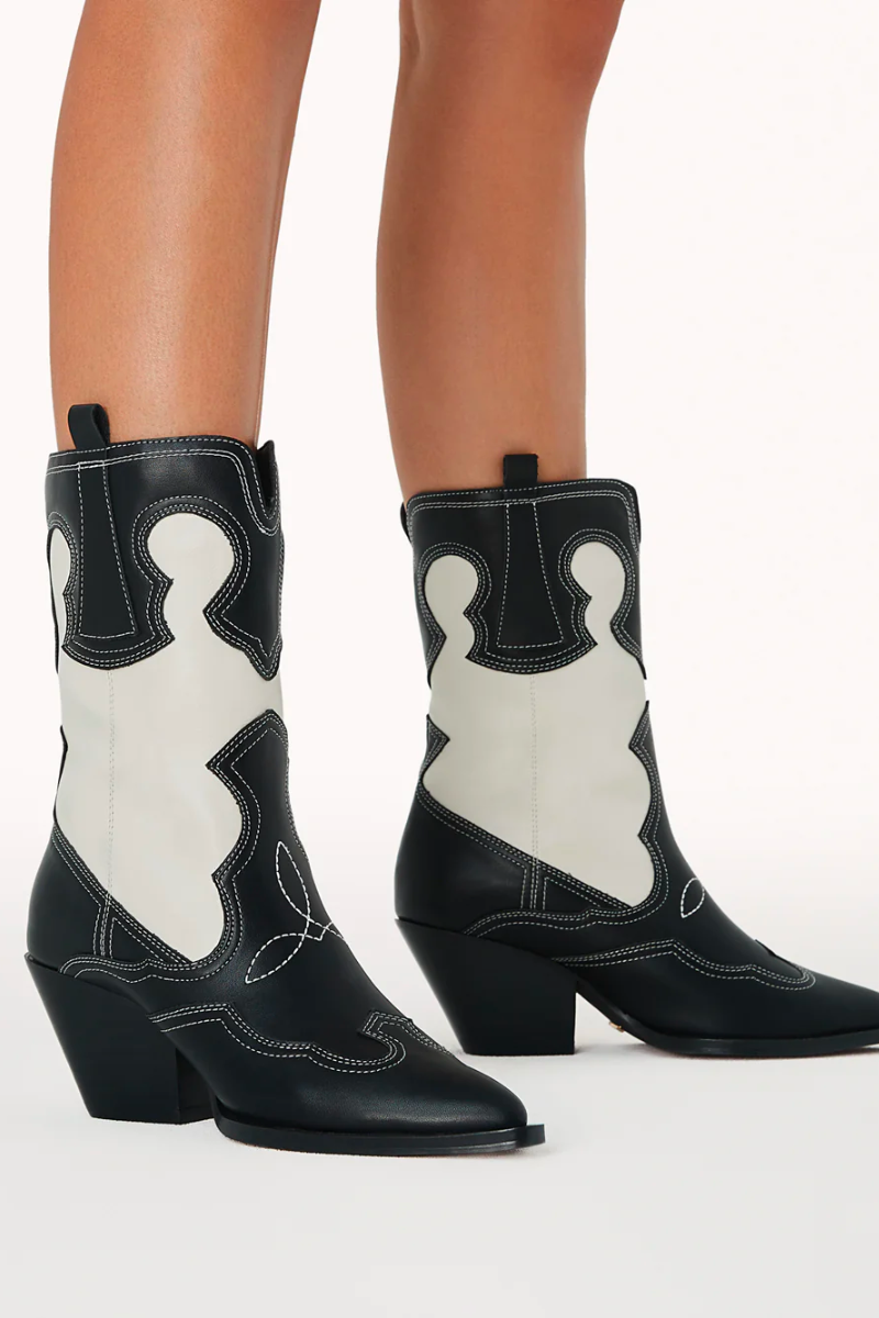 trendy black and white western boots - shoes for a country festival
