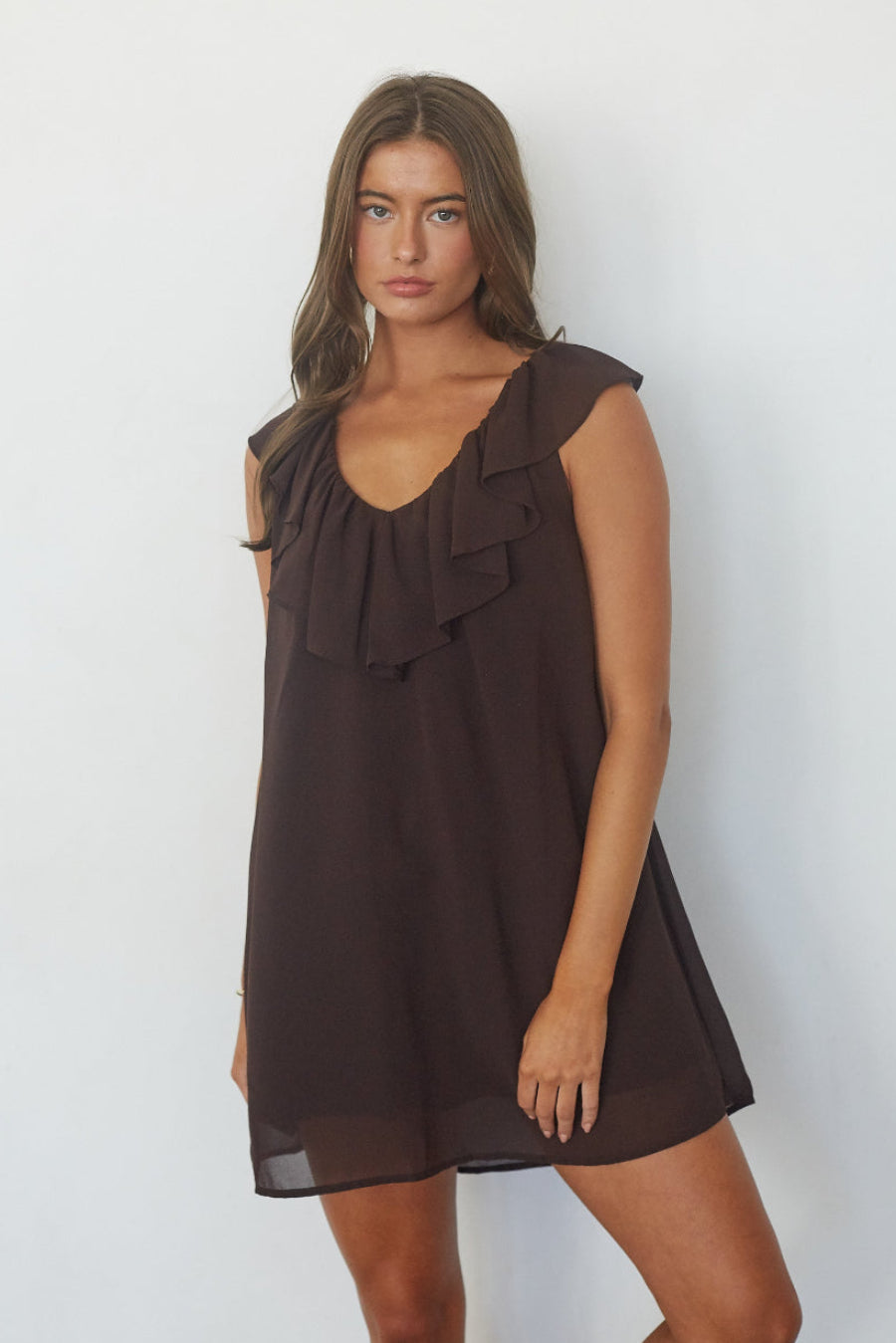 Chocolate brown ruffle chiffon babydoll mini dress, front view on model