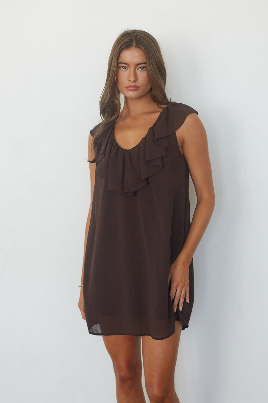 Chocolate brown ruffle chiffon babydoll mini dress, full-length front view on model