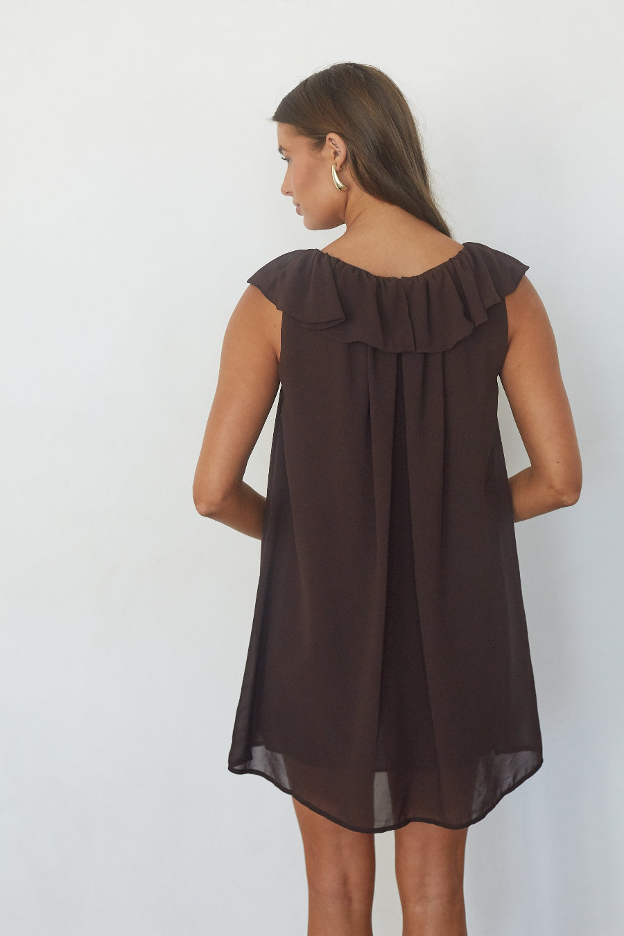 Chocolate brown ruffle chiffon babydoll mini dress, back view on model