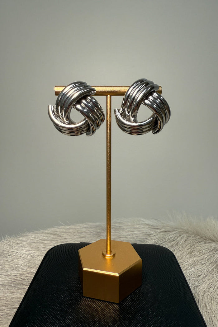 silver-image | front-image | elegant silver earrings | knot design | front view of statement earrings featuring an intricate knotted design in silver 