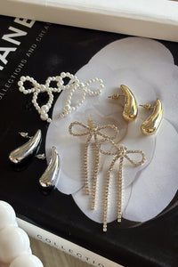 Aerial view | Gold Rhinestone Bow drop studs | Bruch evet drop studs