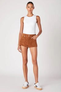 Person wearing a white sleeveless top and brown shorts on a white background