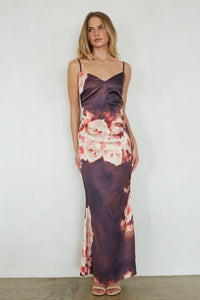 brown-image | front-image | Woman wearing a floral slip dress against a white background