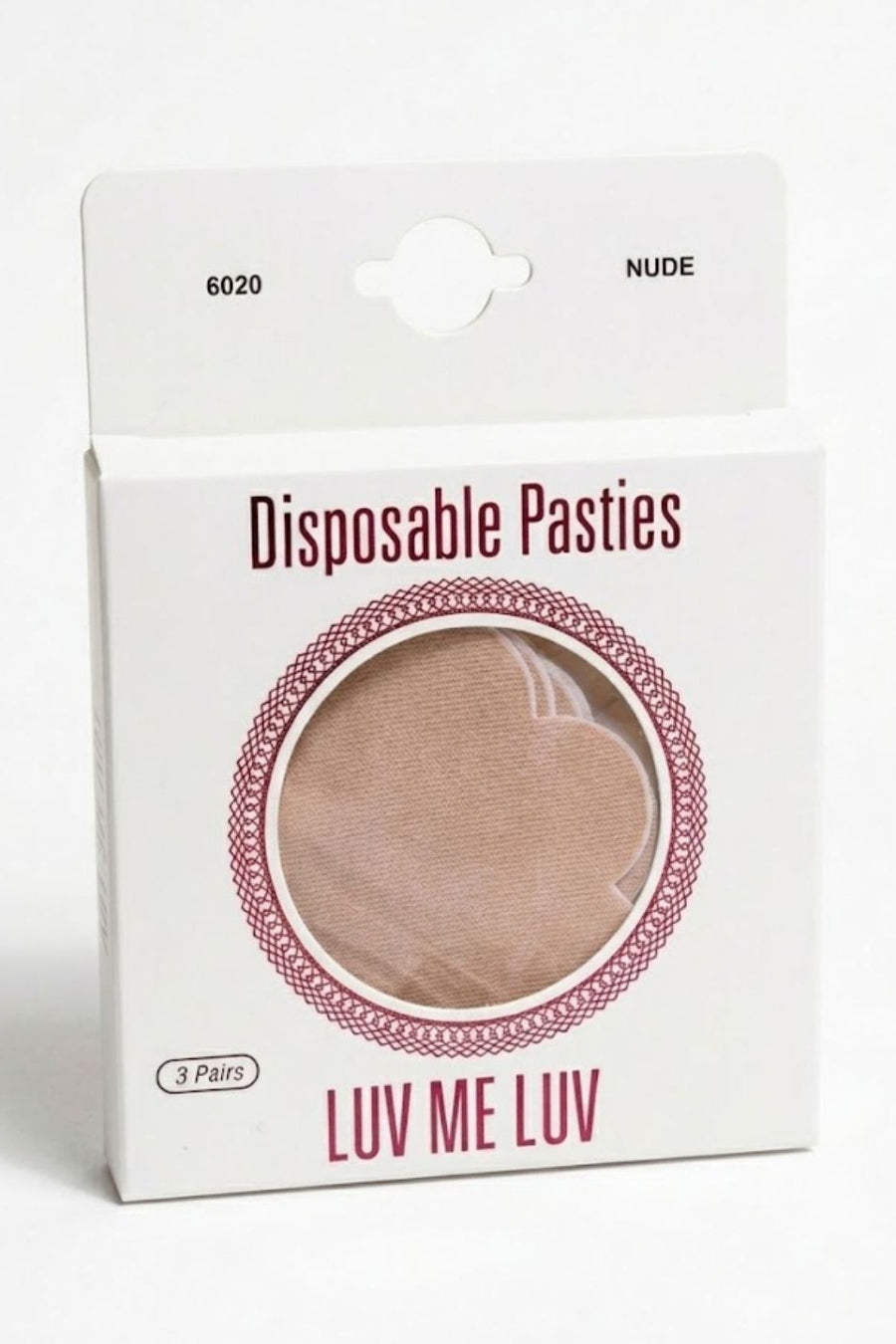 A package of Luv Me Luv disposable pasties in shade 6020 Nude. The white cardboard packaging features a circular clear window showing the nude-colored pastie inside, with pink text and decorative borders.