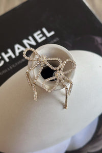 Aerial view | Gold Rhinestone Bow drop studs | daytime event drop suds