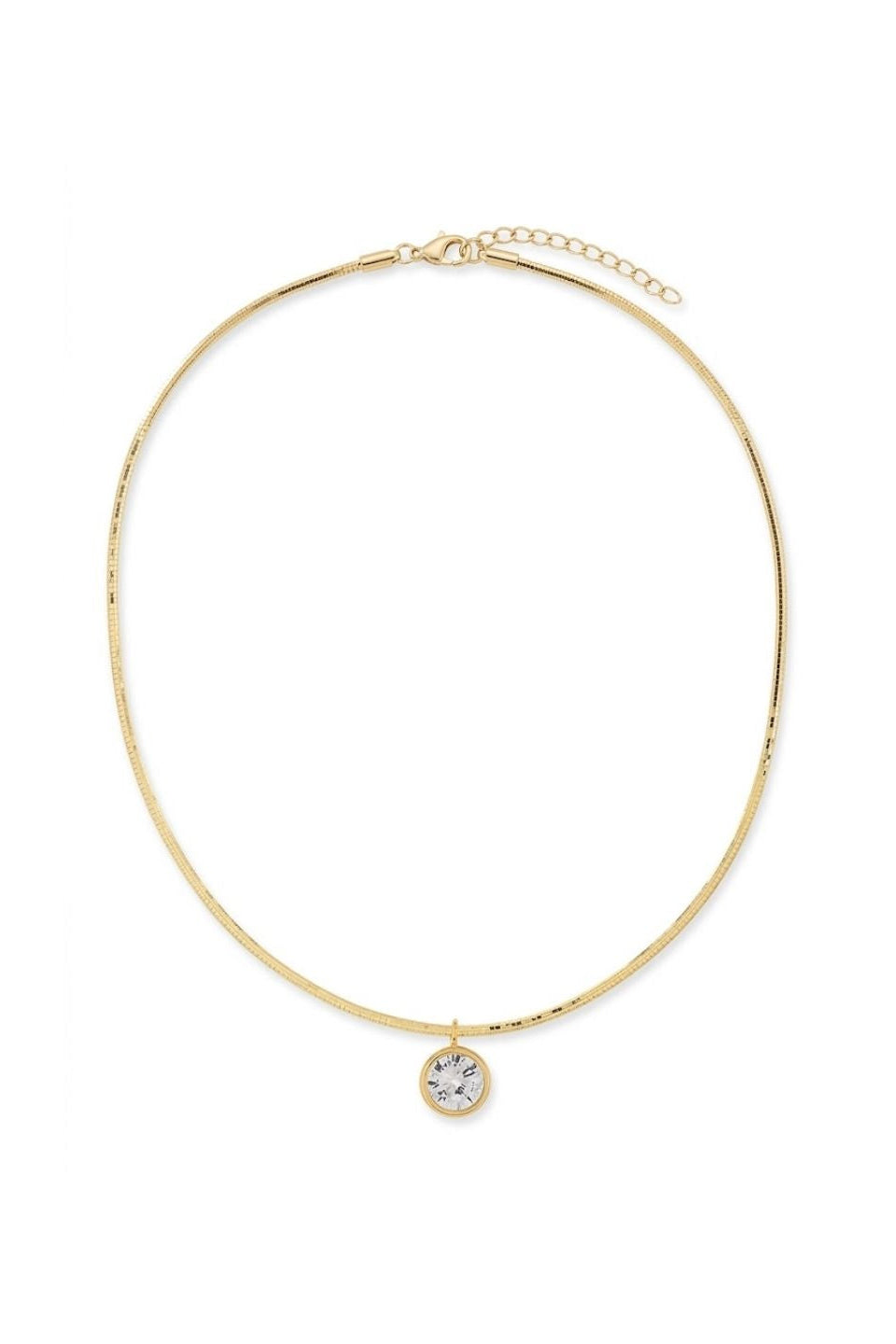 A delicate gold snake chain necklace with a small round bezel-set clear gemstone pendant, displayed on a clean white background.