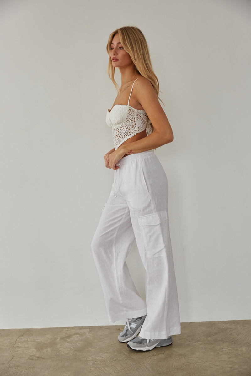 white linen pants with cargo style pockets - summer vacation outfit inspo - wide leg linen pants