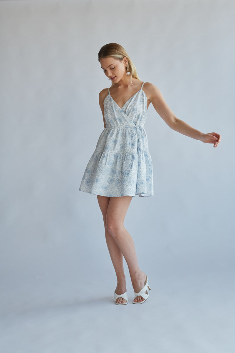 floral wrap mini dress Whitney Floral Wrap Mini Dress Shop American Threads Women's Trendy Online Boutique White/Blue Floral / L