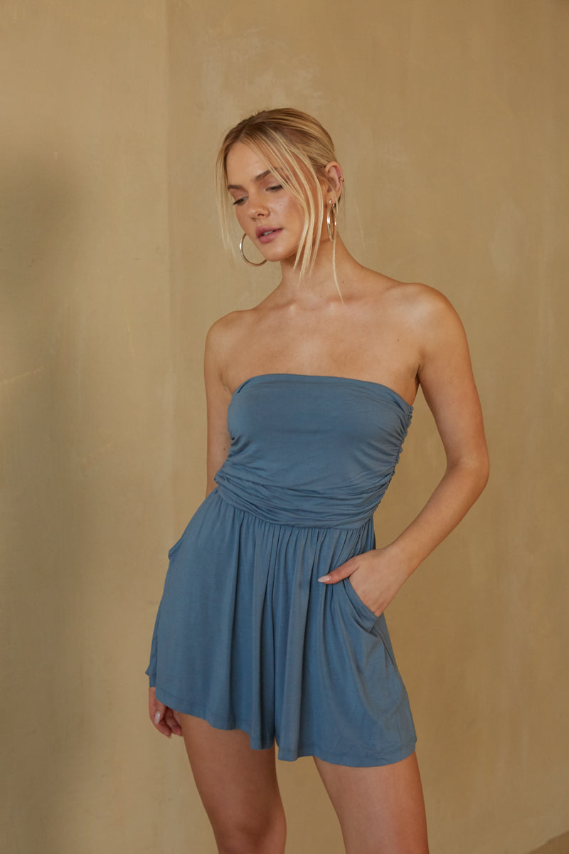dusty blue strapless romper - beach vacation outfit ideas