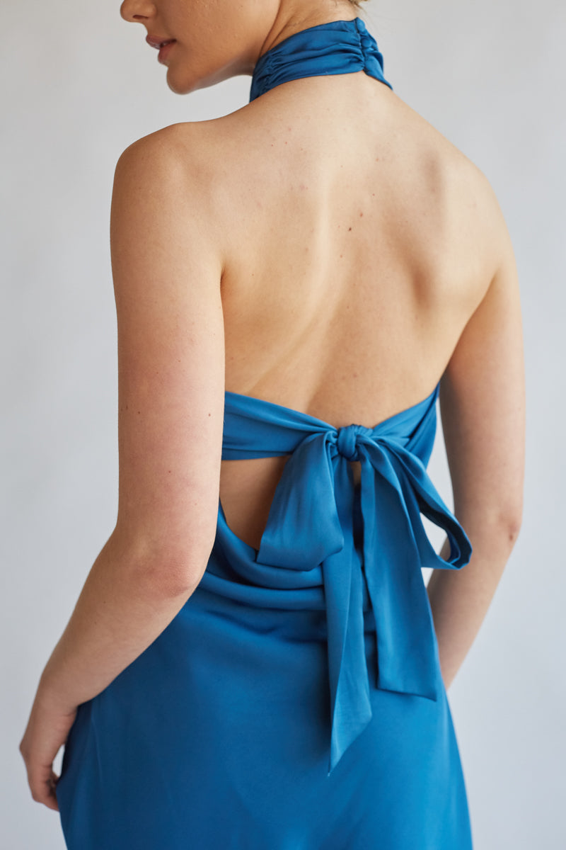 electric blue high neck mini dress with open back bow detailing | trending formal mini dress boutique