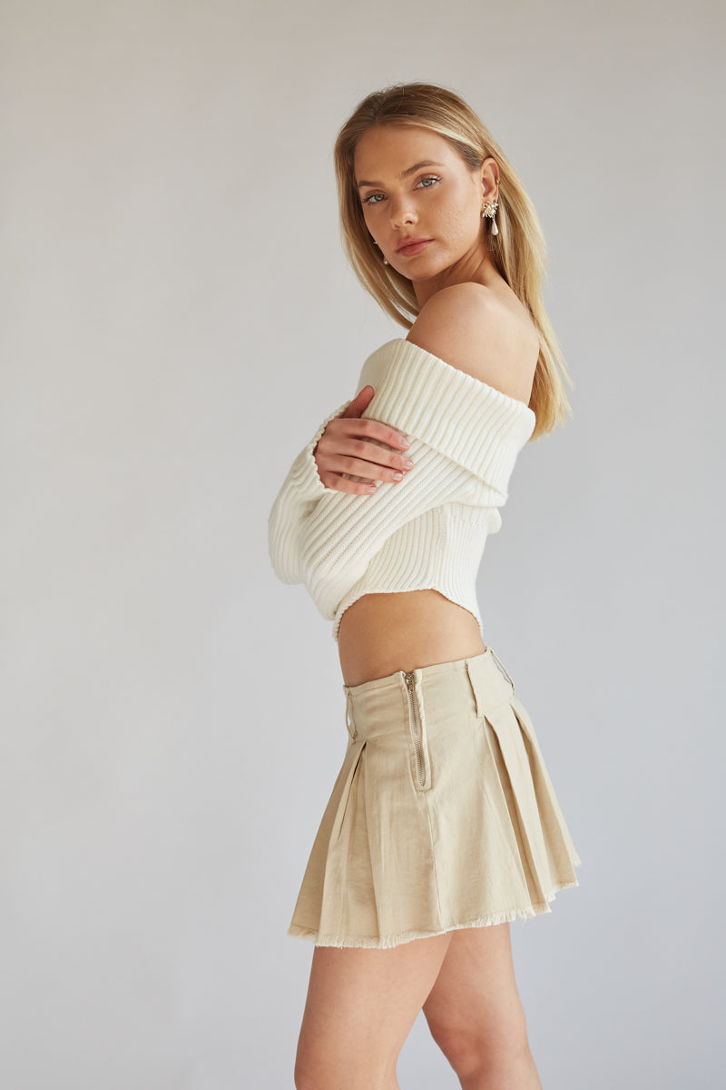 white foldover off the shoulder cropped asymmetrical hel crop top | trendy long sleeve going out tops
