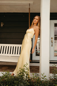 butter yellow silk dress Hyacinth House Goldie Maxi Butter Yellow / XS This piece will be the staple in your wardrobe you didnt know you needed Lamira Yellow Satin Mini Dress