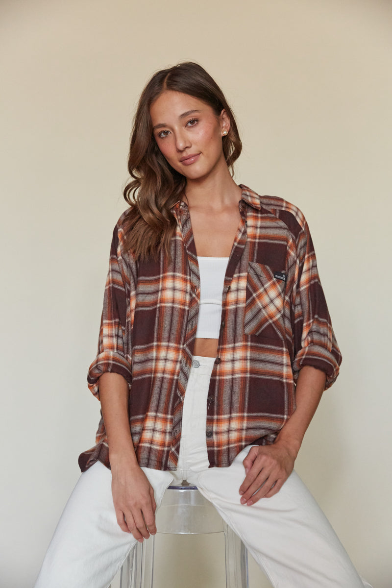 brown and orange plaid button up flannel with pocket 