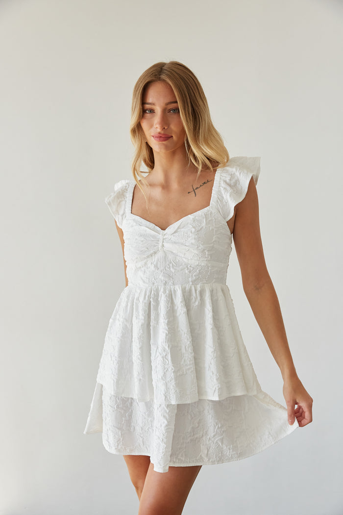 front view | white textured flutter sleeve fit and flare tiered mini dress