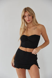 black matching skirt set - ruched tube top and mini skirt - summer vacation outfit inspo