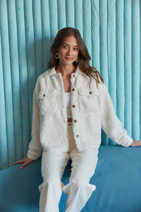white fluffy sherpa jacket with front pocket and buttons | winter must-haves 