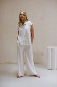 white button up collared shirt - trendy white beach cover up - resort wear outfit