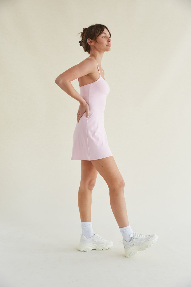 baby pink mini tennis dress with built-in shorts