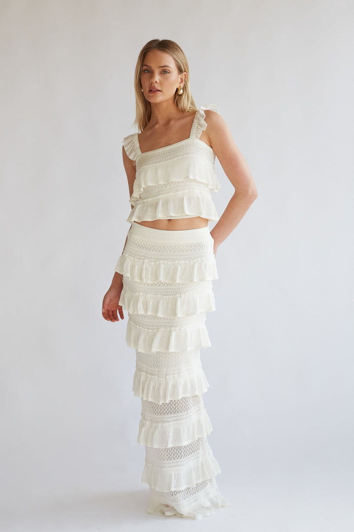off white crochet knit tiered ruffle sleeveless crop top and maxi skirt set | unique coachella outfits