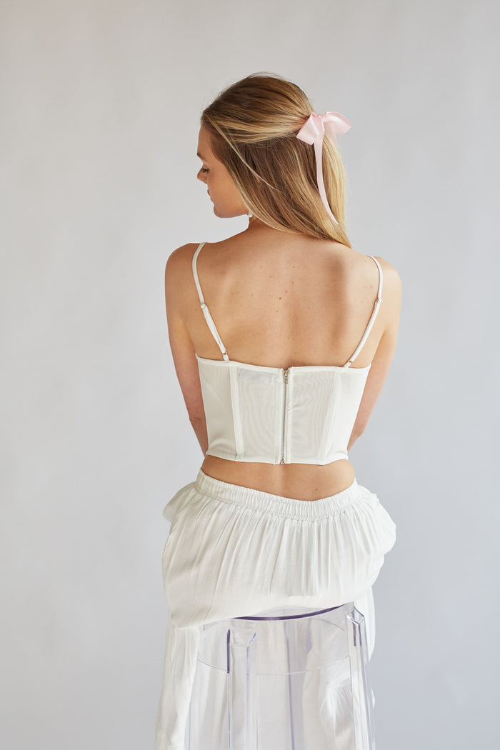 white spag strap corset top with sheer mesh and pink satin rosettes | feminine white corset top for spring