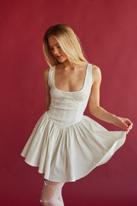 romantic white a line mini dress with v waist and flattering corset bodice | white mini dresses for rush 2024