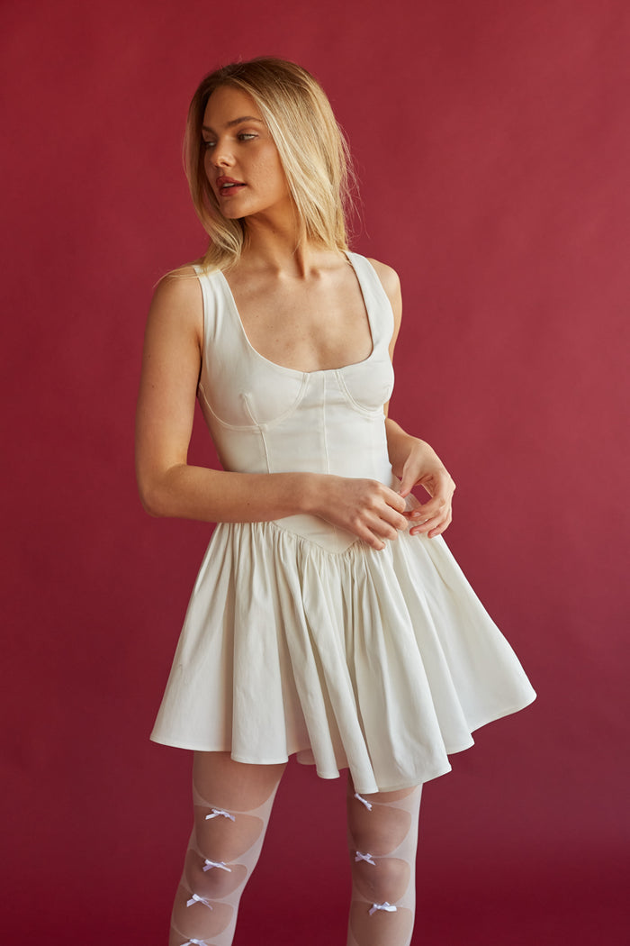 deep scoop neckline corset bodice mini dress with flared mini skirt | white mini dresses for 2024 brides and bachelorettes