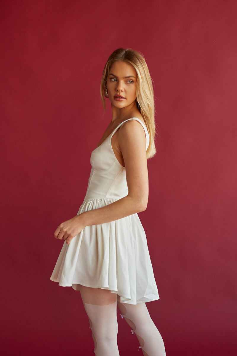 dlaney mini dress white Delaney The Boutique at Mira's Turn heads in the Delaney Halter Mini Dress Delaney Corset Mini Dress |