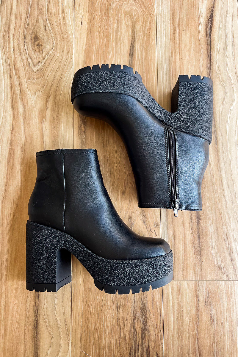 black combat booties with chunky heel and zippers