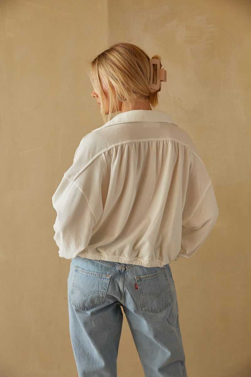 cream exposed seam pullover with elastic waistband and back pleating - cozy winter basics you need 