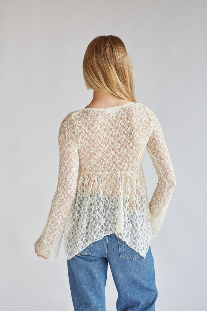 cream sheer lace top with peplum waist and bell sleeves | bohemian top for vacation outfit 