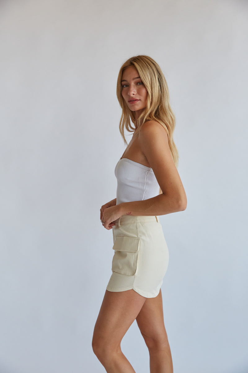 cream mini skirt with cargo style pockets