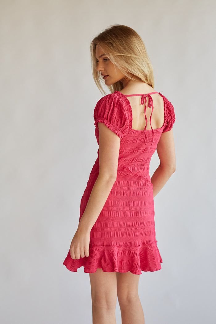 hot pink smocked bodycon mini dress with puff sleeves and ruffle hem | what to wear for rush 2024