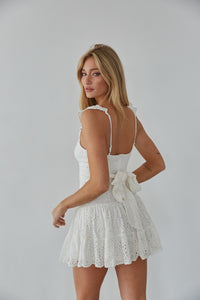 white riffle strap bow back lace mini dress | white lace mini dress