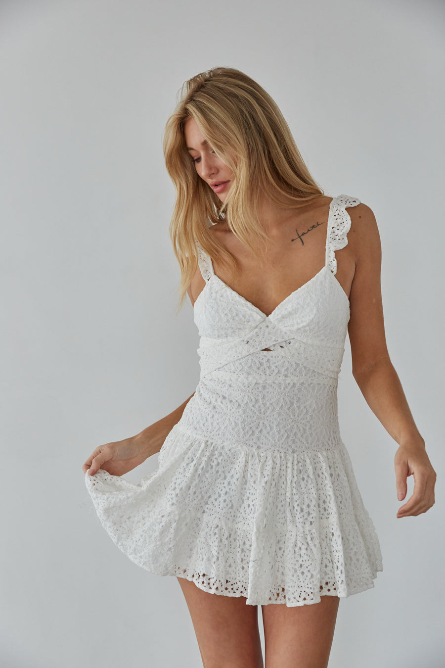 white ruffle strap keyhole cutout drop waist lace mini dress | trendy white mini dress boutique
