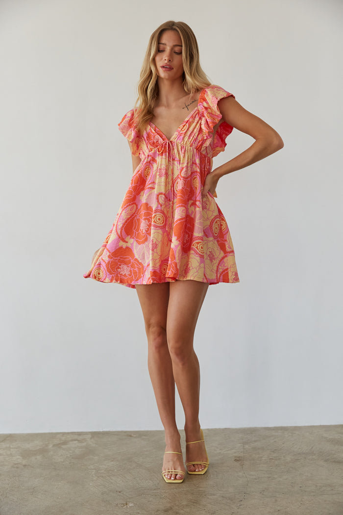 front view | orange floral flutter sleeve babydoll mini dress | summer dress inspo 