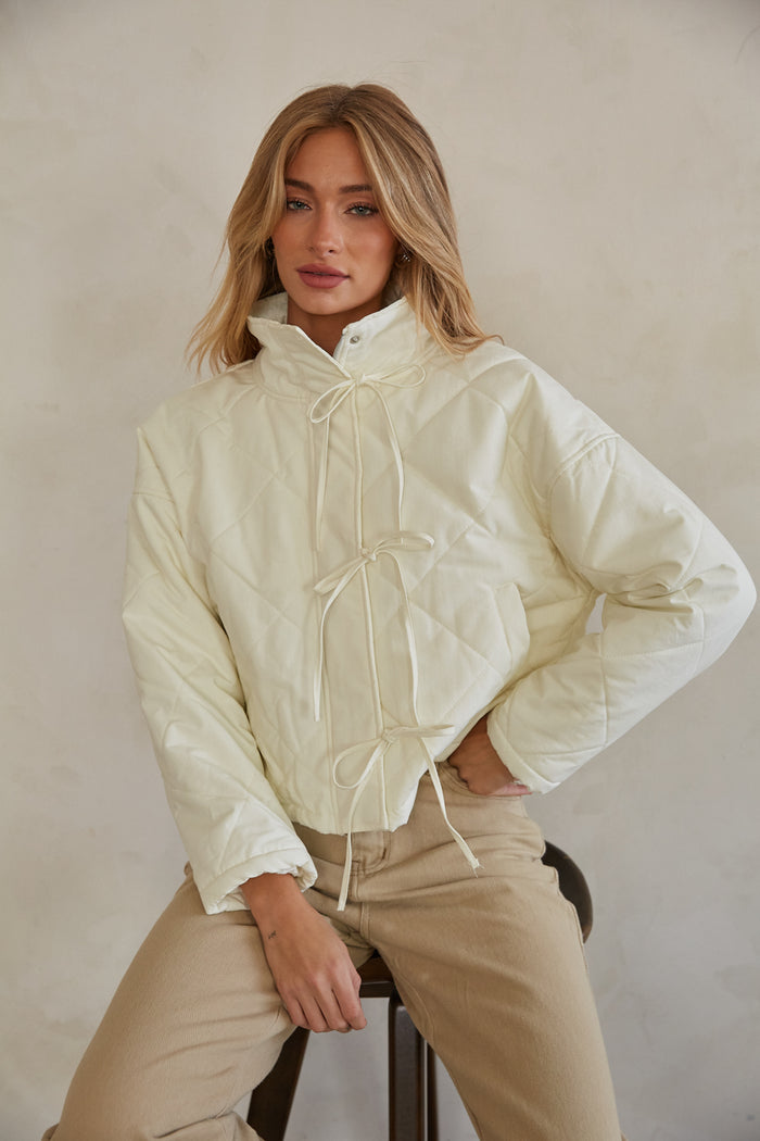 ivory-image | front-image | Ivory Coquette Quilted Tie Bow Front Puffer Jacket with Button Collar | Ivory jacket | white jacket | puffer jacket