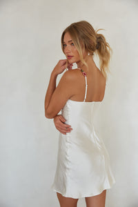 side view | white satin mini slip dress with floral embroidery trim | trendy summer mini dress