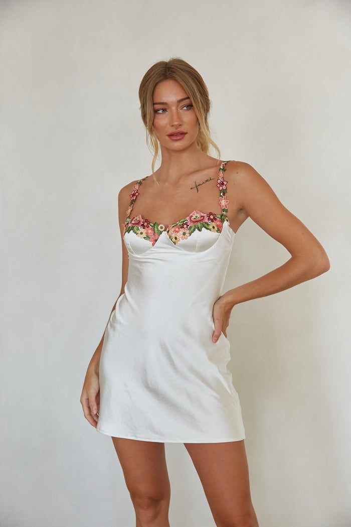 front view | white satin mini slip dress with floral embroidery trim | trendy summer mini dress